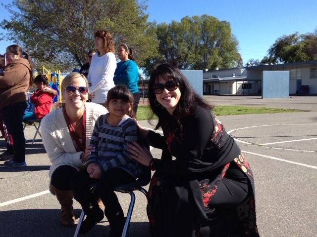 Dr. Mafi bonds with students at our Tet celebration!