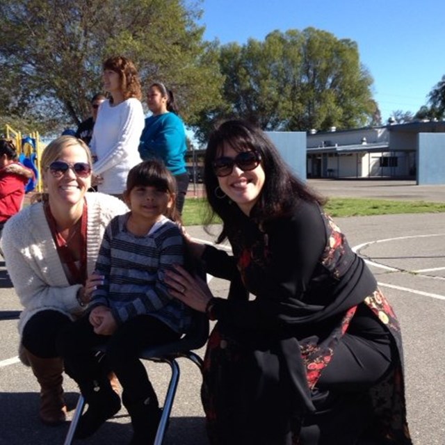 Dr. Mafi bonds with students at our Tet celebration!